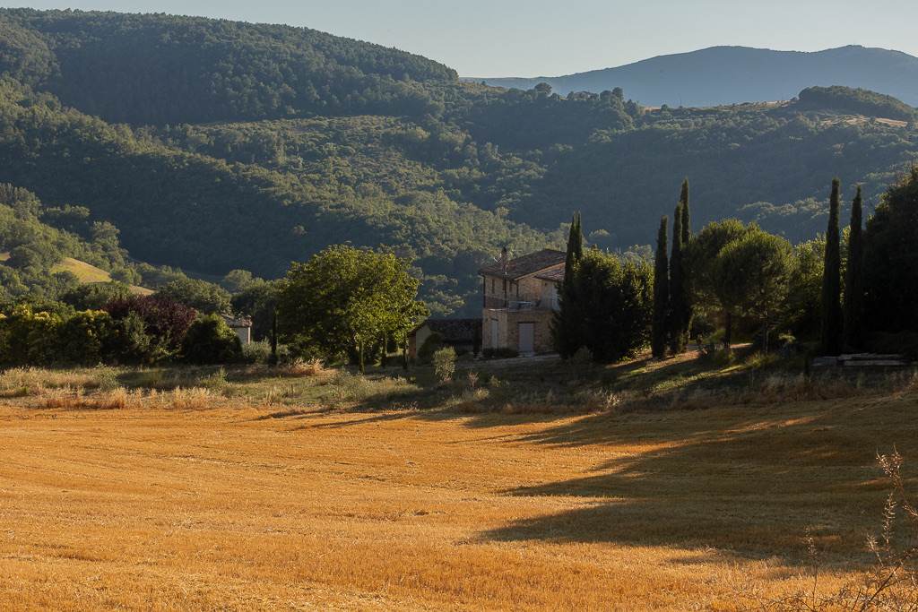 Villa Ortali swimming pool and terrace overlooking the Umbrian countryside